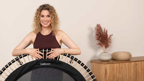 Woman holding her new bellicon. 