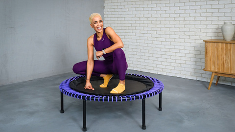 Woman in a deep squat on the bellicon.