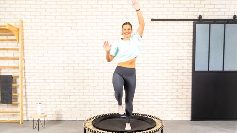 Cycle-based training: Woman joyfully working out on the bellicon.